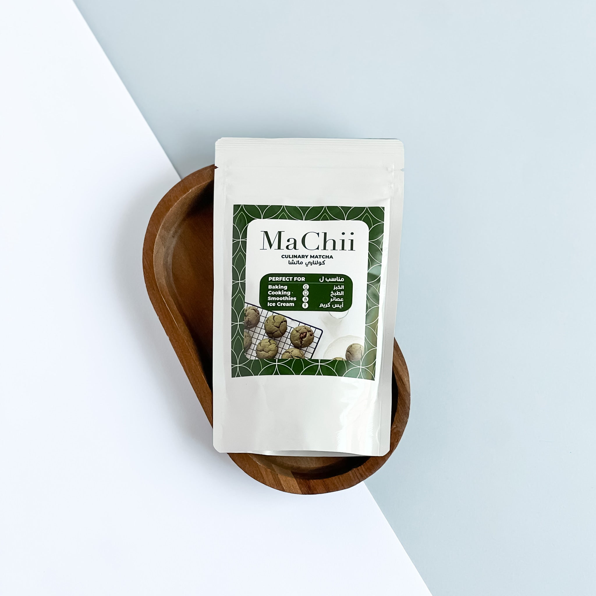 organic culinary matcha for cooking and baking. the ziplock bag is placed over a wooden plate