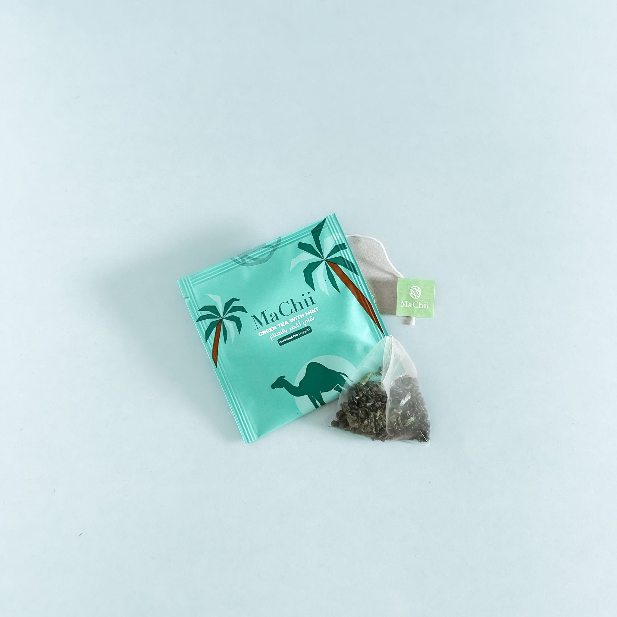 gunpowder green tea with mint wrapped in an enveloped machii tea pyramid tea bag