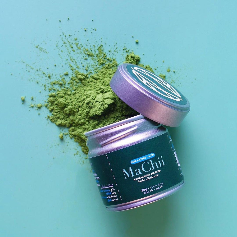 
                  
                    matcha for lattes pouring ourt of a silver tin
                  
                