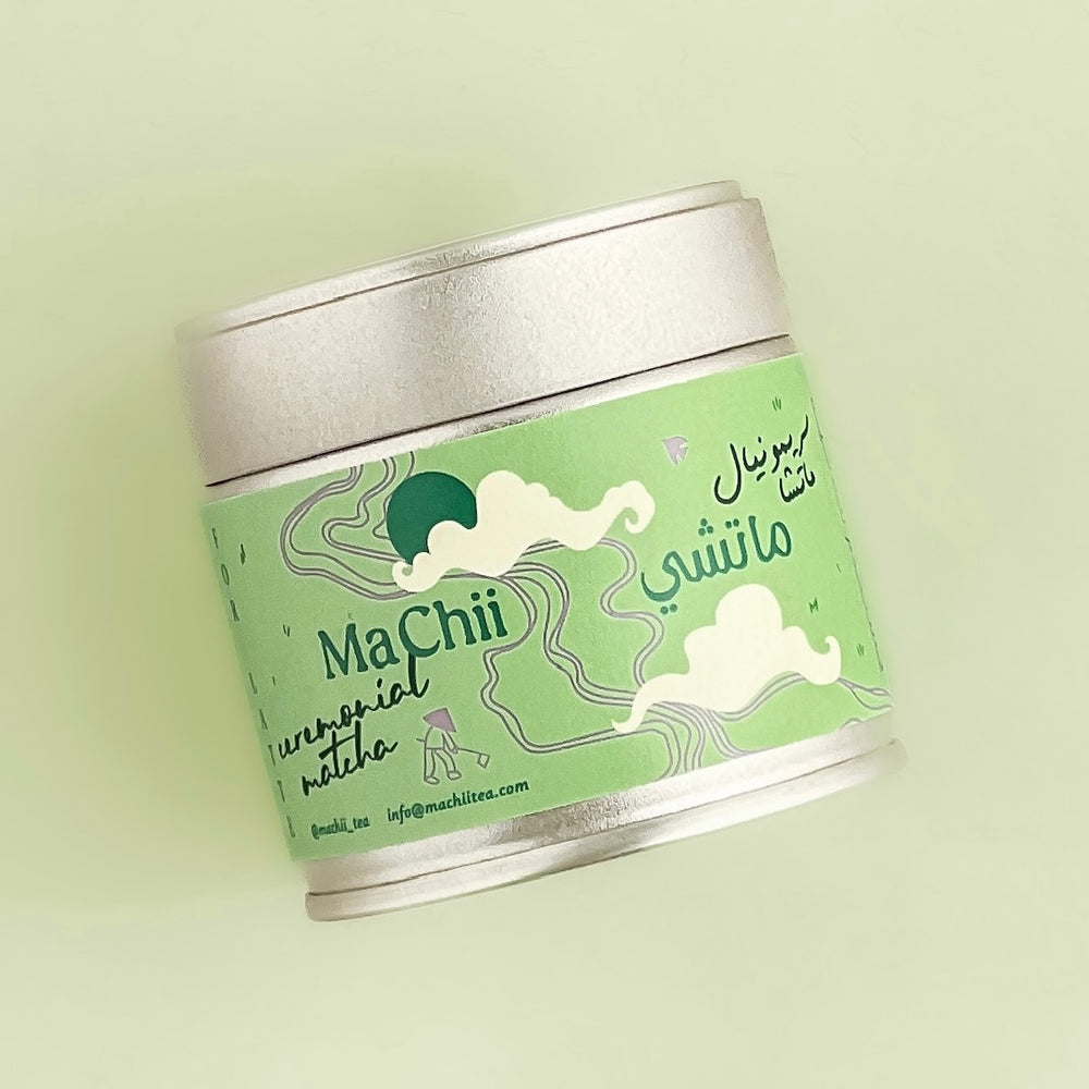 organic first harvest ceremonial matcha for lattes tin on a neutral background. machii tea logo on the tin. 