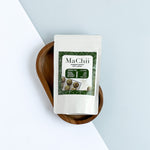 organic culinary matcha for cooking and baking. the ziplock bag is placed over a wooden plate