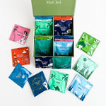 tea gift box with japans sencha green tea, Chinese gunpowder green tea, milk oolong tea, mint tea, chamomile tea, herbal tea, bedtime tea, English breakfast black tea, jasmine white tea, and earl grey tea. 