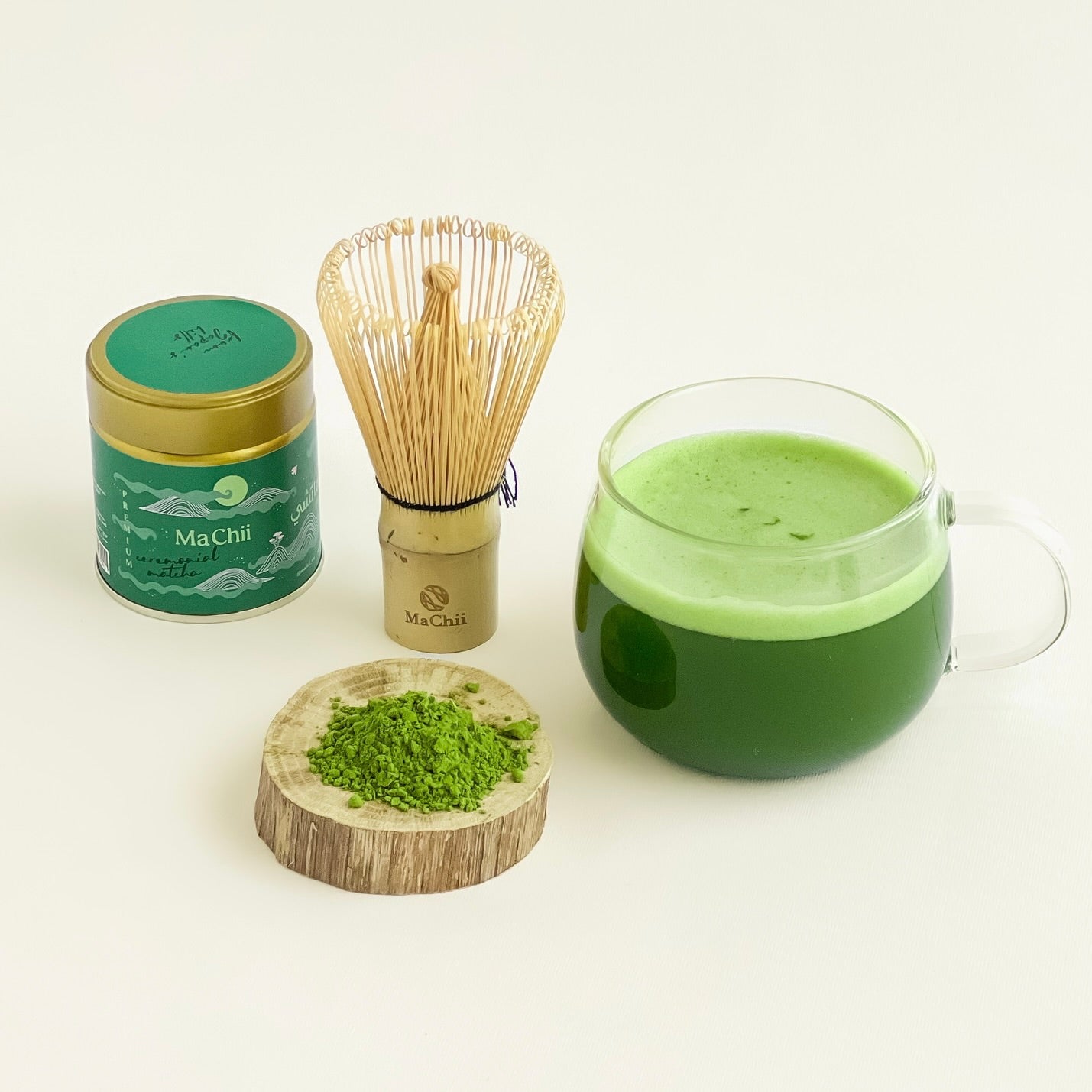 ceremonial matcha premium with a matcha whisk and a cup of traditional ...