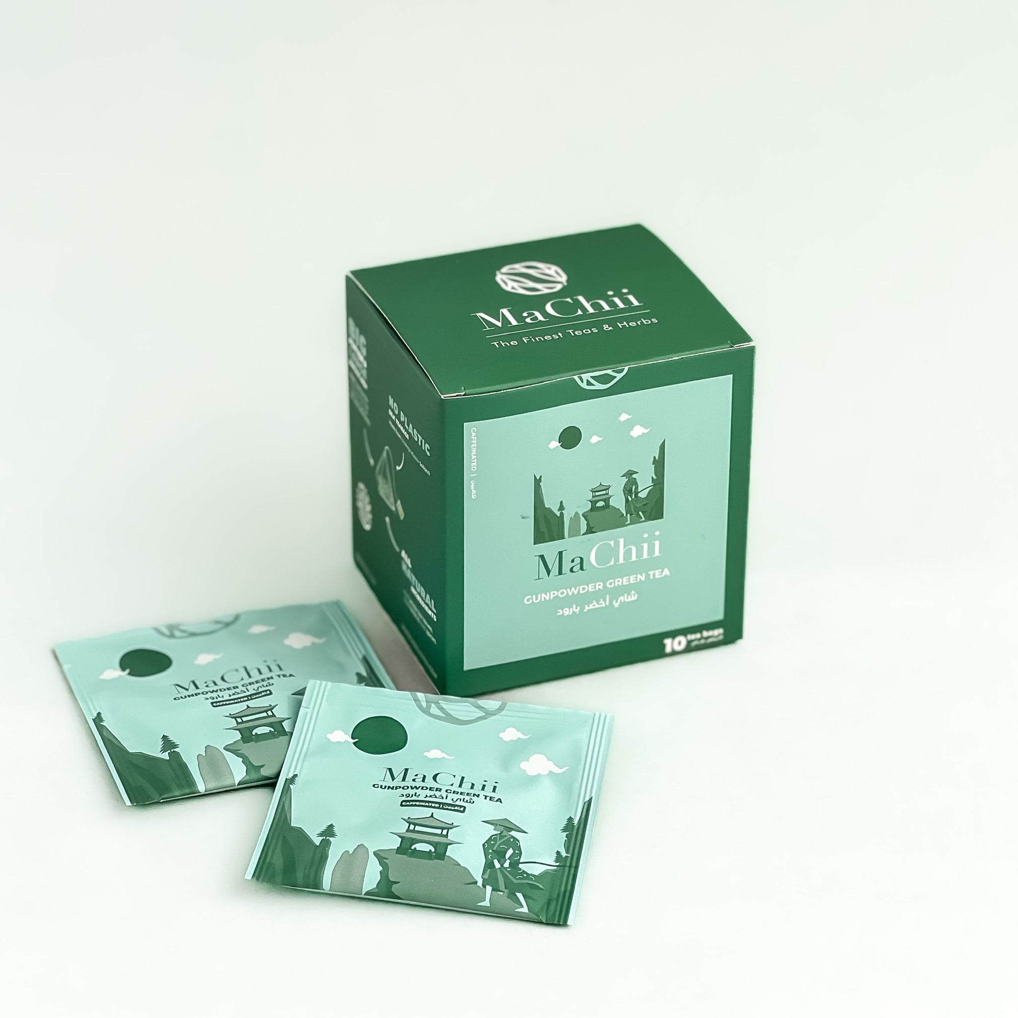 organic gunpowder green tea teabags next to a box of 10 envelopes with MaChii Tea logo