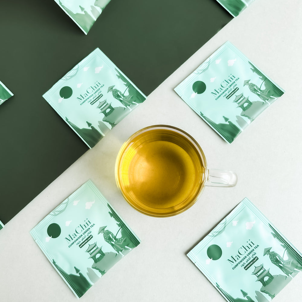 
                  
                    Organic Chinese green tea brewing in a cup 
                  
                